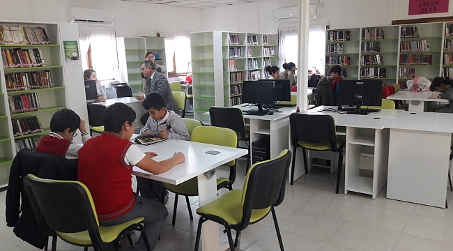 Dokuz'dan kütüphaneye ziyaret