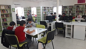 Dokuz'dan kütüphaneye ziyaret