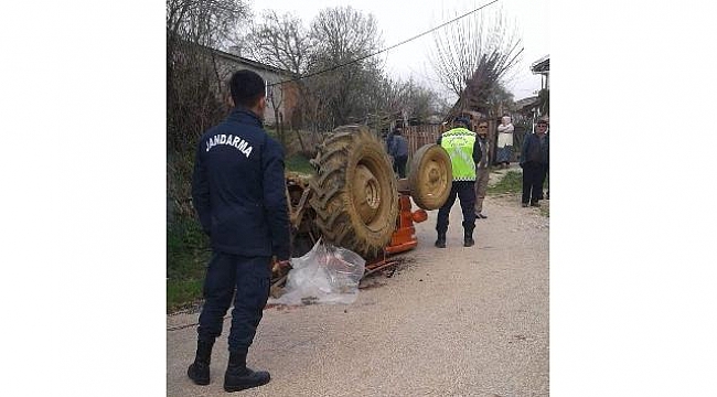 DEVRİLEN TRAKTÖRÜN ALTINDA CAN VERDİ!