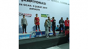 KÜRSÜNÜN ÜST SIRALARI ÇANAKKALELİ WUSHUCULARA EMANET