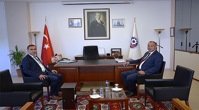 EZİNE KAYMAKAMI ALİ İKRAM TUNA'DAN SELÇUK SEMİZOĞLU'NA VEDA ZİYARETİ