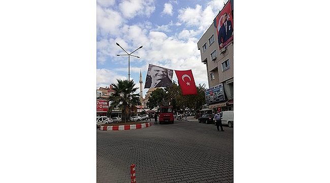 ÇAN, ATATÜRK VE BAYRAKLARLA DONATILDI