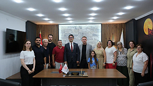 REKTÖR ERENOĞLU'NDAN 15 TEMMUZ'DA ŞEHİT AİLELERİ VE GAZİLERE ANLAMLI ZİYARET